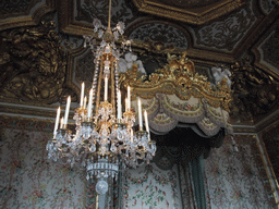 Chandelier and balustrade in the Queen`s Bedroom in the Grand Appartement de la Reine in the Palace of Versailles