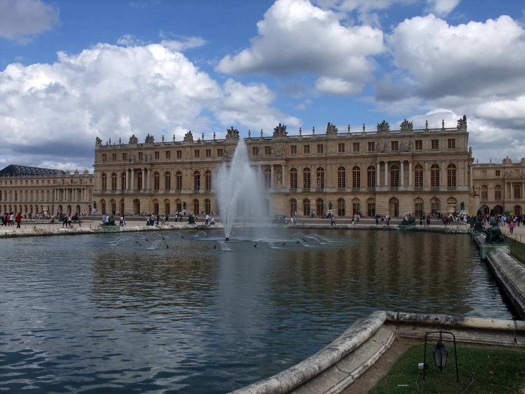 The back side of the Palace of Versailles and the Parterre d`Eau fountain in the Gardens of Versailles