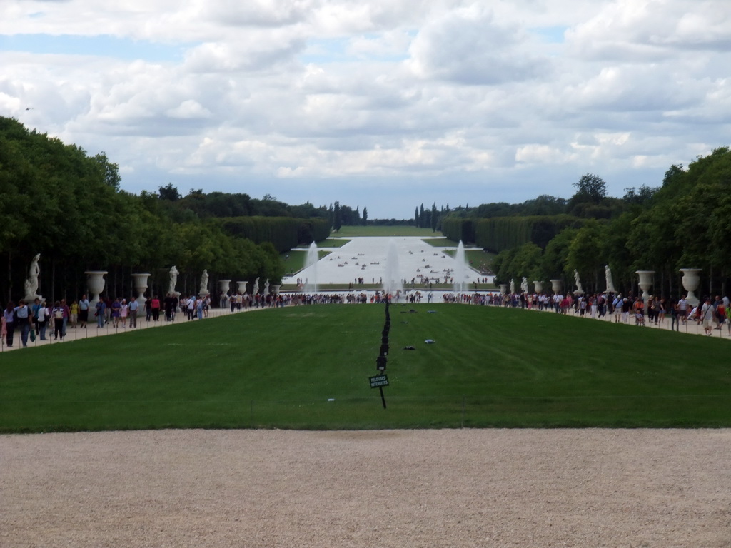 The Tapis Vert lawn, the Bassin d`Apollon fountain and the Grand Canal in the Gardens of Versailles