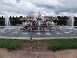 The Bassin de Latone fountain in the Gardens of Versailles and the back side of the Palace of Versailles