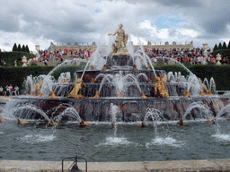 The Bassin de Latone fountain in the Gardens of Versailles and the back side of the Palace of Versailles