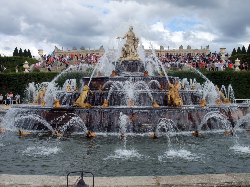 The Bassin de Latone fountain in the Gardens of Versailles and the back side of the Palace of Versailles