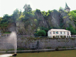 Fountain in the Our river, the Rue du Vieux Marche street and the Hockelstour tower of the Vianden Castle, viewed from the Rue Victor Hugo street