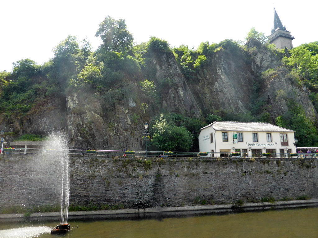 Fountain in the Our river, the Rue du Vieux Marche street and the Hockelstour tower of the Vianden Castle, viewed from the Rue Victor Hugo street