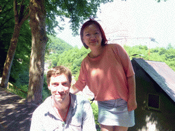 Tim and Miaomiao at the Rue de Diekirch street, with a view on the Vianden Castle