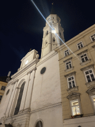 Front of St. Michael`s Church at the Michaelerplatz square, by night