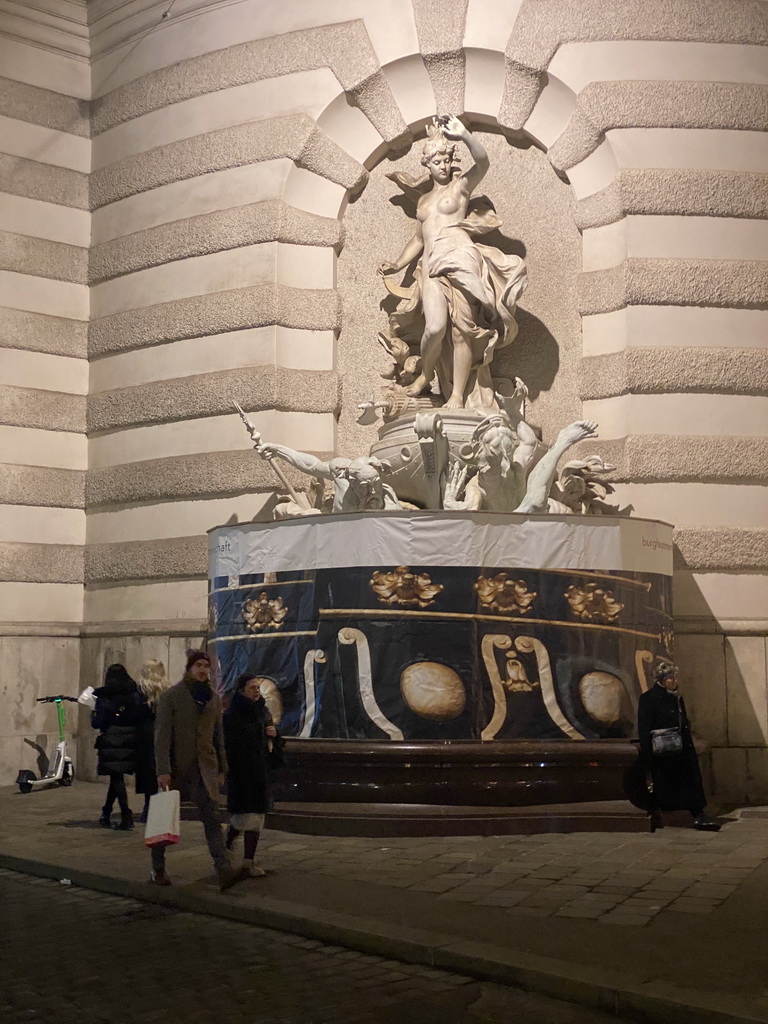 Fountain in front of the Spanish Riding School at the Michaelerplatz square, by night