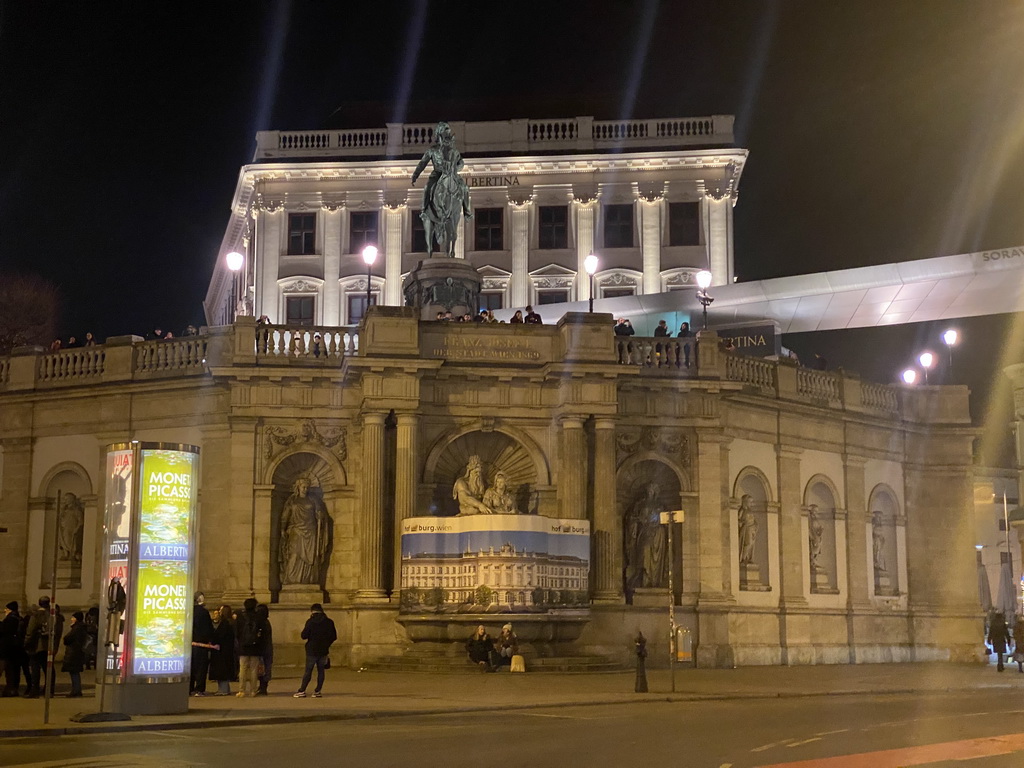 The Albertinaplatz square with the Albrechtsbrunnen fountain and the front of the Albertina museum with the Archduke Albrecht Monument, by night