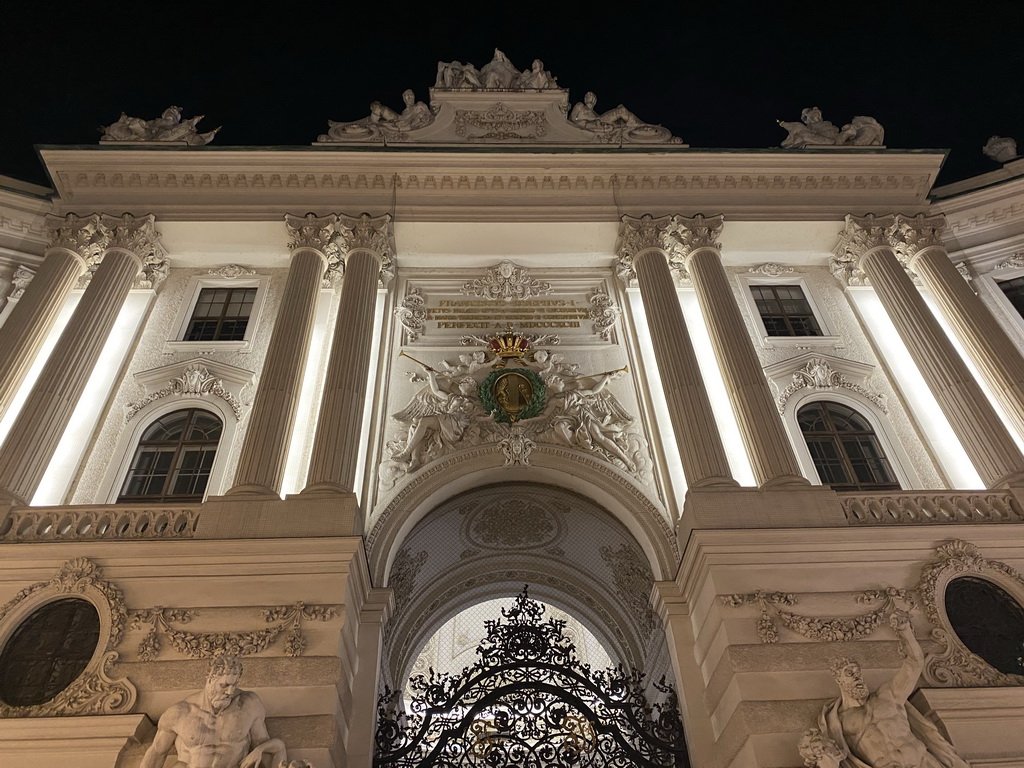 Facade of the Hofburg palace at the Michaelerplatz square, by night