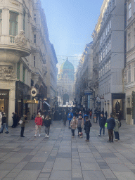 The Kohlmarkt street and the front and dome of the Hofburg palace