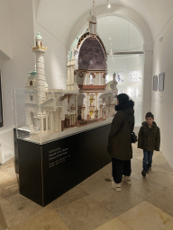 Miaomiao and Max with a scale model of the Karlskirche church at the first floor