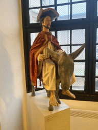 Statue of Jesus on a Donkey at the first floor of the Karlskirche church, with explanation
