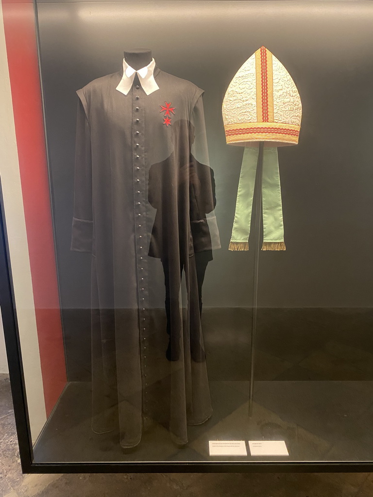 Vestment and miter at the first floor of the Karlskirche church, with explanation