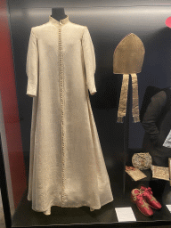 Vestment, miter, bags and shoes at the first floor of the Karlskirche church, with explanation