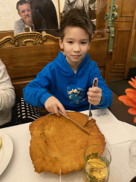 Max with a Wiener Schnitzel at the Figlmüller at Wollzeile restaurant