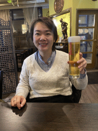 Miaomiao with a Murauer beer at the Spice of India restaurant