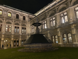 Opernbrunnen fountain at the southwest side of the Wiener Staatsoper building at the Operngasse street, by night