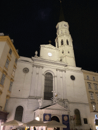 Front of St. Michael`s Church at the Michaelerplatz square, by night