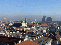 The east side of the city with the Jesuit Church and the Bahnhof Wien Mitte railway station, viewed from the viewing platform at the North Tower of St. Stephen`s Cathedral
