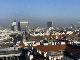 The northeast side of the city with the Juwel Wien building, the SO/ Vienna hotel and the Wiener Riesenrad ferris wheel, viewed from the viewing platform at the North Tower of St. Stephen`s Cathedral