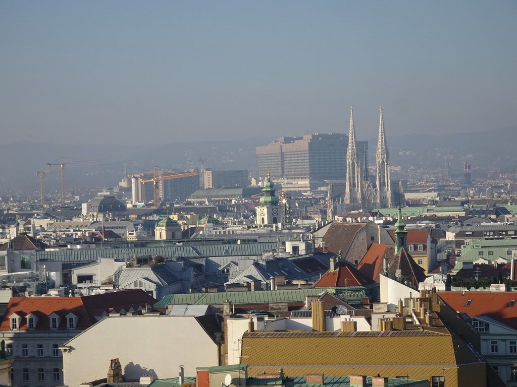 The northwest side of the city with the Votivkirche church, viewed from the viewing platform at the North Tower of St. Stephen`s Cathedral