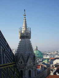 Northwest small tower and mosaic roof at St. Stephen`s Cathedral and St. Peter`s Catholic Church, viewed from the viewing platform at the North Tower