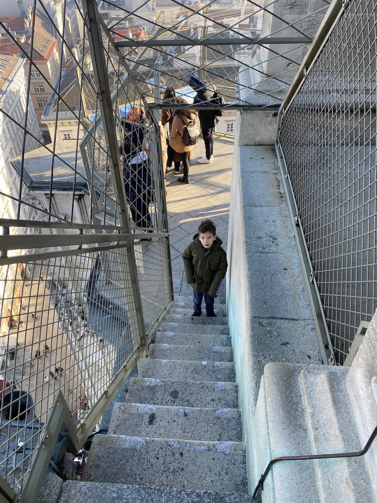 Max on a staircase at the viewing platform at the North Tower of St. Stephen`s Cathedral