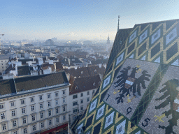 The northeast side of the city and the mosaic roof of St. Stephen`s Cathedral, viewed from the viewing platform at the North Tower