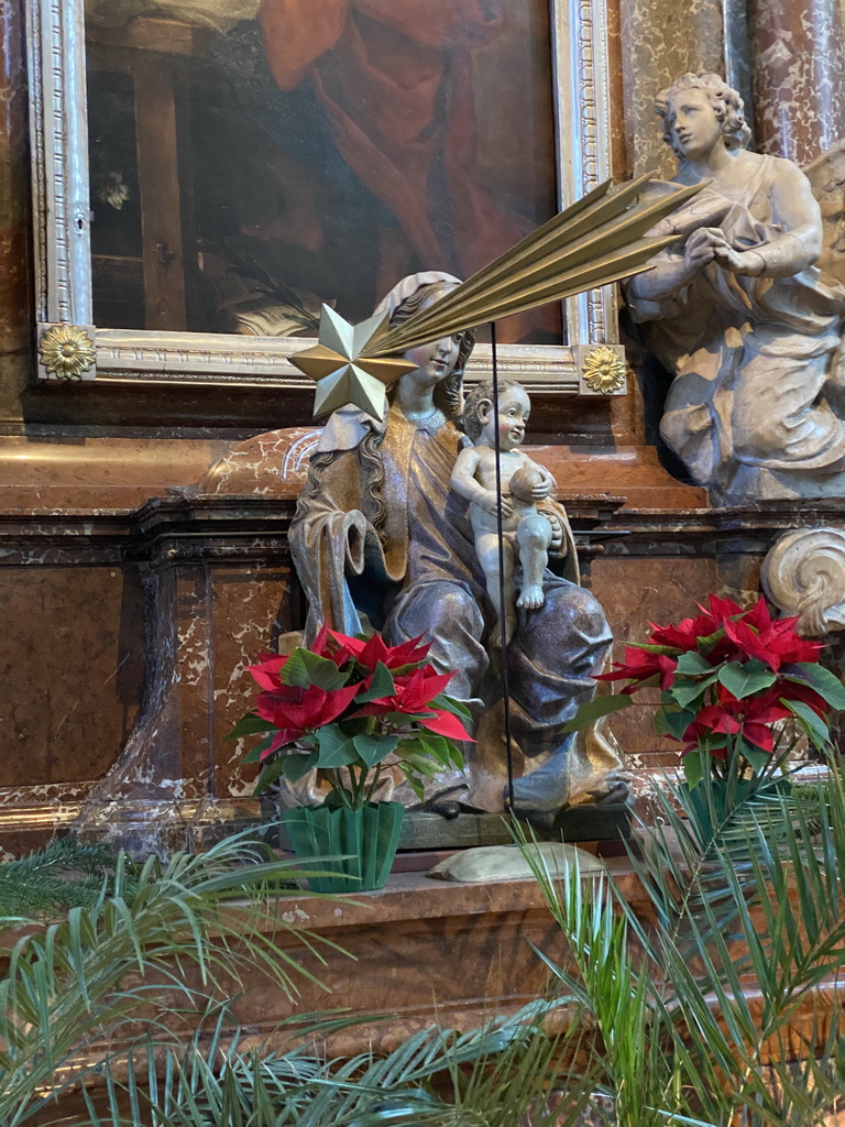 Statues and painting above the nativity scene at St. Stephen`s Cathedral