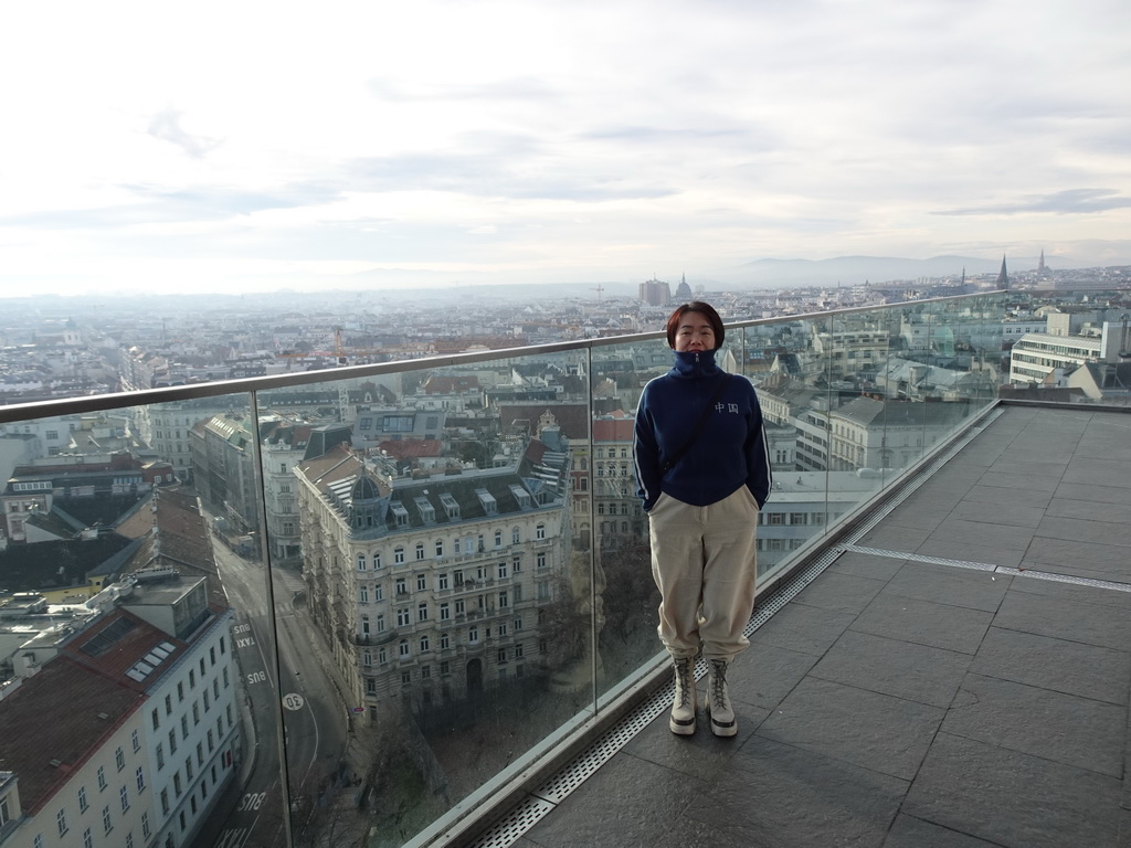 Miaomiao at the rooftop terrace at the eleventh floor of the Haus des Meeres aquarium, with a view on the southwest side of the city