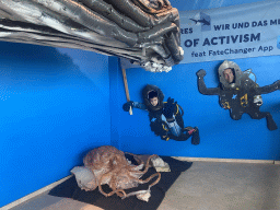 Tim and Max with plastic Octopus and Whale at the `The Sea and Us` exhibition at the sixth floor of the Haus des Meeres aquarium