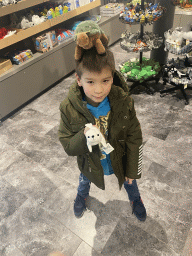 Max with plush toys at the shop at the ground floor of the Haus des Meeres aquarium