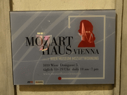 Sign at the back side of the Mozarthaus Vienna at the Schulerstraße street, by night