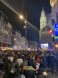 The Stock-im-Eisen-Platz square and the Stephansplatz square with a Silvesterpfad stage and the southwest side of St. Stephen`s Cathedral, by night