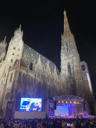 The Stephansplatz square with a Silvesterpfad stage and the southwest side of St. Stephen`s Cathedral, by night