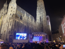 The Stephansplatz square with a Silvesterpfad stage and the southwest side of St. Stephen`s Cathedral, by night