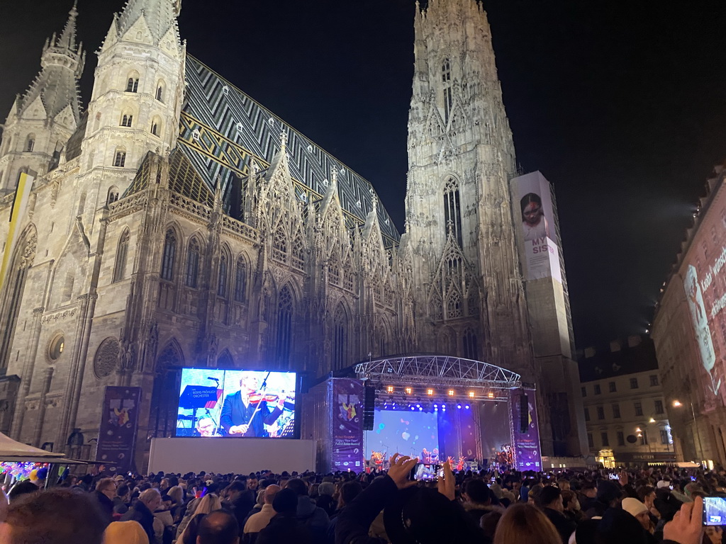 The Stephansplatz square with a Silvesterpfad stage and the southwest side of St. Stephen`s Cathedral, by night