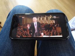 Tim watching the Vienna New Year`s Concert on his iPhone at our room at the fourth floor of the Benediktushaus im Schottenstift hotel