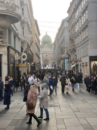 The Kohlmarkt street and the front and dome of the Hofburg palace