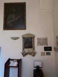 Paintings and plaques at the side chapel of the Schottenkirche church