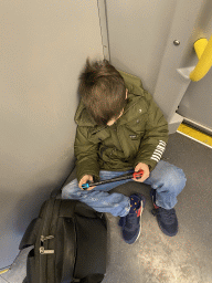 Max playing on his Nintendo Switch in the subway train between the Karlsplatz and Schönbrunn subway stations