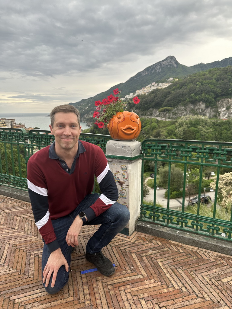 Tim at the parking lot of the Piazza Matteotti square, with a view on the city center and the west side of the city