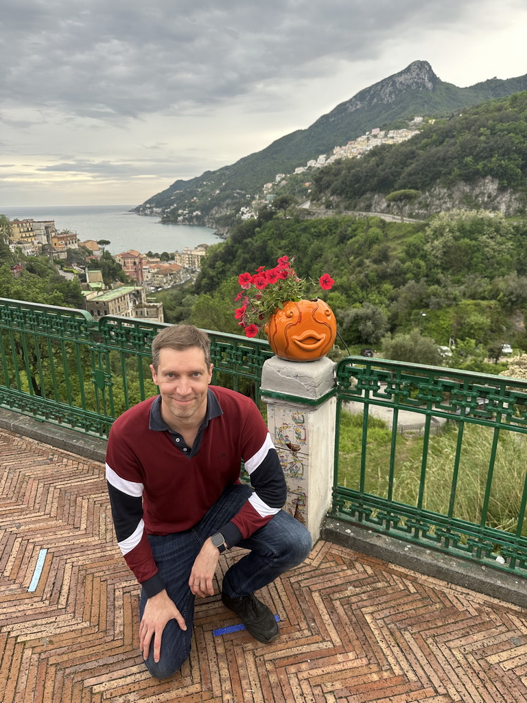 Tim at the parking lot of the Piazza Matteotti square, with a view on the city center and the west side of the city