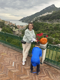 Miaomiao and Max at the parking lot of the Piazza Matteotti square, with a view on the city center and the west side of the city