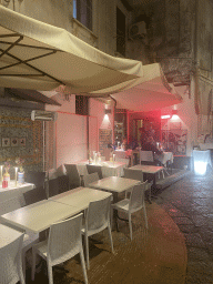 Front of the Ristorante Evu` restaurant at the Via Diego Taiani street, by night