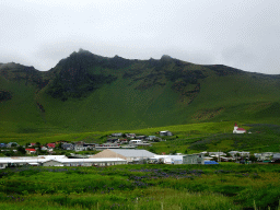The town center and mountains, viewed from the parking lot of the Black Sand Beach