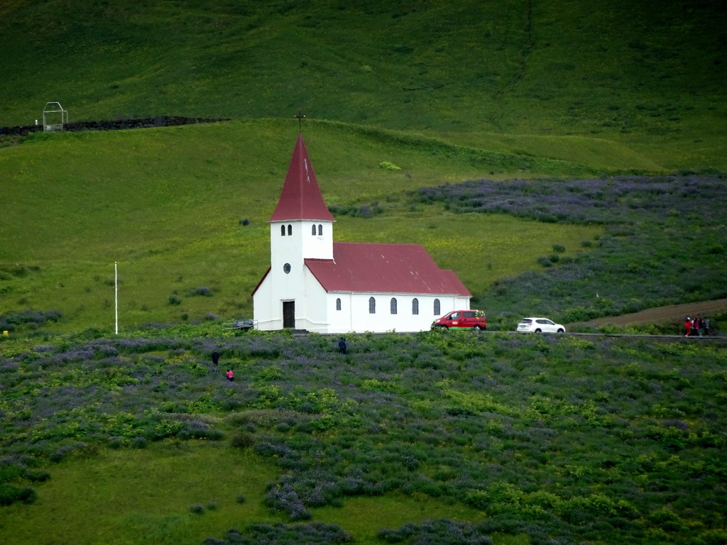 The Vikurkirkja church, viewed from the parking lot of the Black Sand Beach
