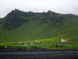 The Vikurkirkja church and mountains, viewed from the Black Sand Beach