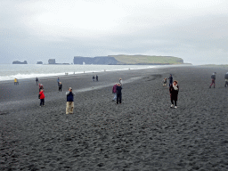 Miaomiao with the west side of Reynisfjara Beach and the Dyrhólaey peninsula