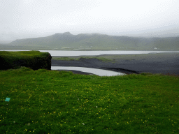 Kirkjufjara beach and Reynisfjara Beach, viewed from the lower viewpoint of the Dyrhólaey peninsula